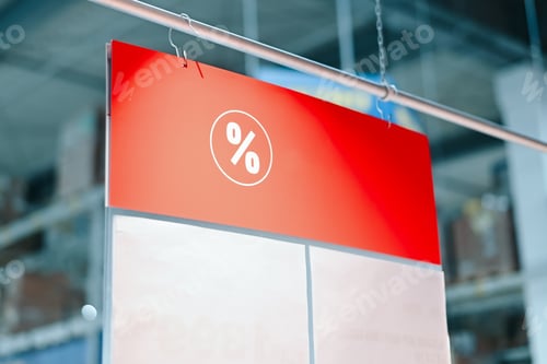 Preview: Information board with a discount icon on a red background hanging in a store