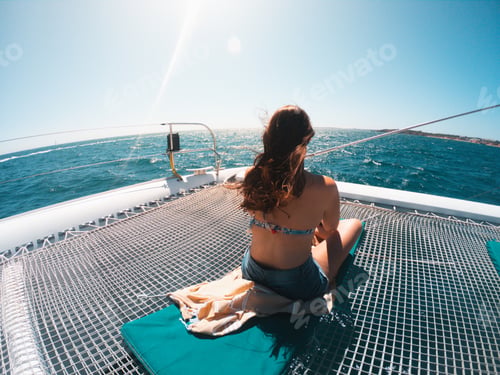 Preview: Female on a yacht admiring the beautiful seascape