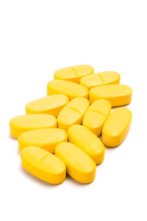 Preview: Pile of Yellow Pills Isolated on White