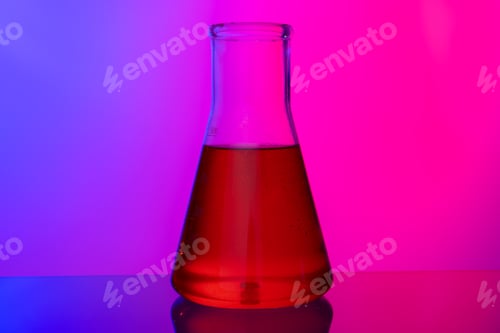 Preview: Laboratory glass tubes with chemicals on bright pink background