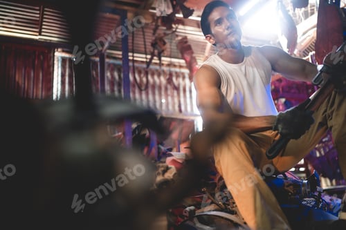 Preview: Vehicle automotive service guy worker doing check or mend car wheel, Asian mechanic repairman