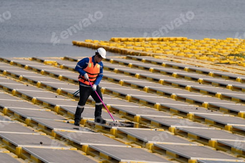 Preview: Floating solar panels providing renewable energy. Aerial view floating on solar cells