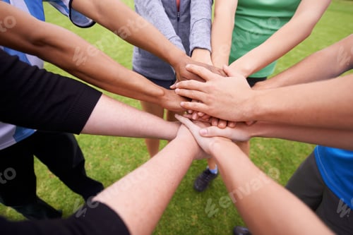 Preview: On three. Cropped shot of a sports team with their hands in a huddle.