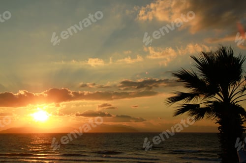 Preview: Sunset at the windy beach coast