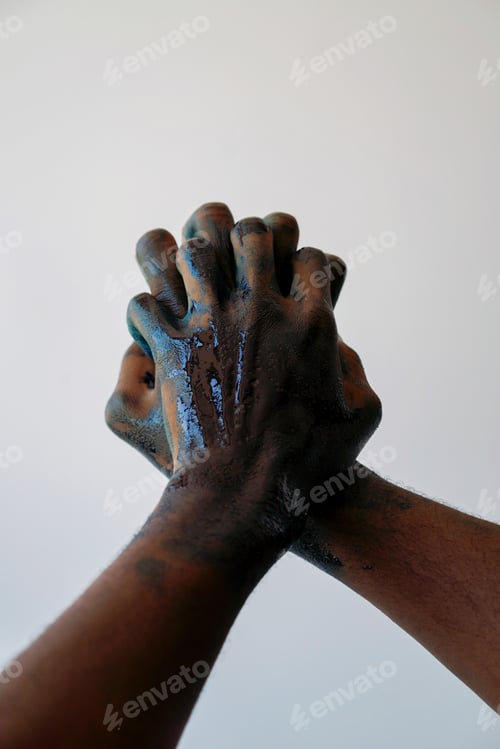 Preview: Dark skin Hands covered in blue paint