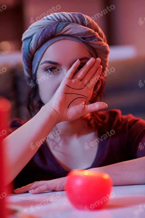 Preview: Chiromancer demonstrating her hand with palmar creases