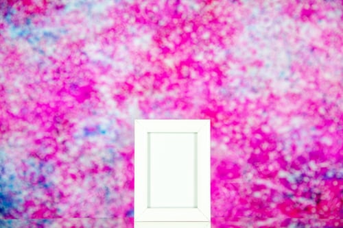 Preview: front view white picture frame on light-pink background family color gift present portrait shoot