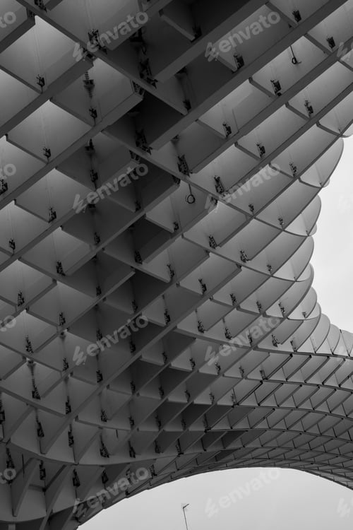 Preview: Vertical grayscale shot of the details of a modern architectural structure