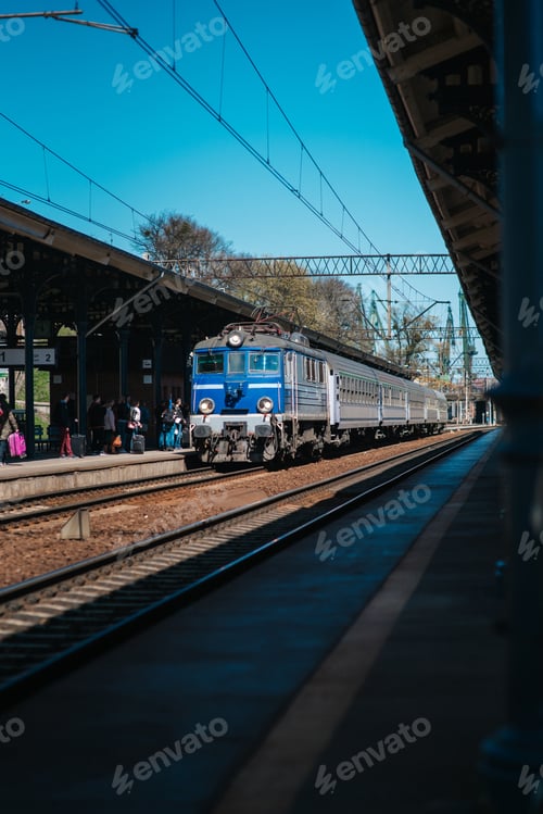 Preview: railway track of the main station with an arriving train
