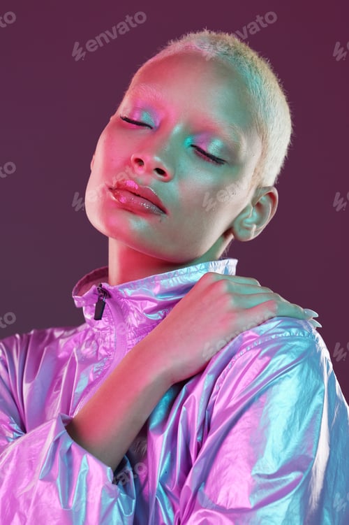 Preview: Holographic fashion, woman face and makeup glow for hologram trend isolated in studio. Futuristic,