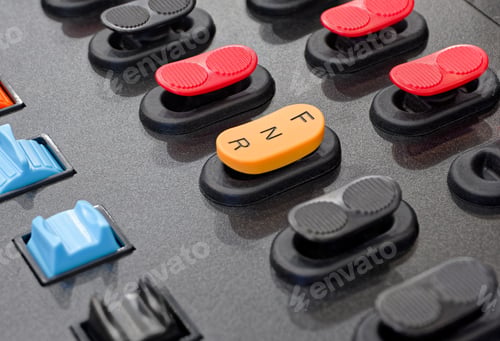 Preview: Black control panel with accorted buttons and switches