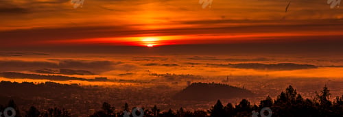 Preview: Panorama of Graz city covered if fog on autumn morning during sunraise