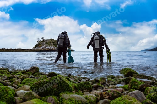 Preview: Scuba Diver getting ready to go diving at Whytecliff Park. Blue Sky Cloudy Day