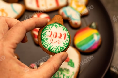 Preview: 2021 homemade gingerbread Christmas cookies on a plate. Christmas moments