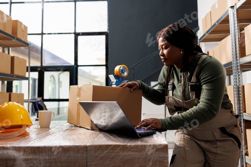 Preview: African american worker checking storehouse logistics