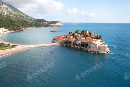 Preview: Amazing Aerial around view of Sveti Stefan resort island in Montenegro. The small old town of Sveti