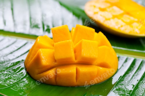 Preview: Fresh Mango on Green Palm Leaf. Close up,
