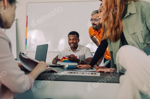 Preview: A diverse businesspeople discussing fiances at boardroom.