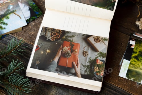Preview: Christmas printed photos in photo album. Photo printing concept.