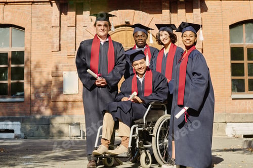 Preview: Happy group of students graduating from university