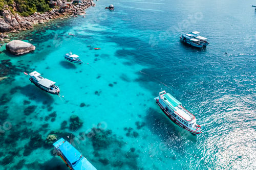 Preview: Boats and crystal clear waters at the bay dive site in Koh Tao,diving tour boat