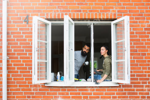 Preview: Couple looking through window
