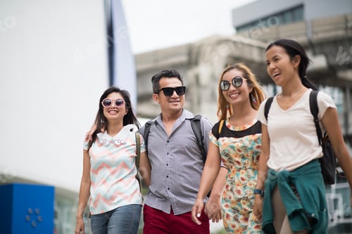 Preview: Tourist group friendship walking travel in the city