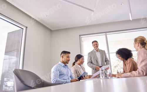 Preview: Happy leader and company employees at business meeting discussing work plan.