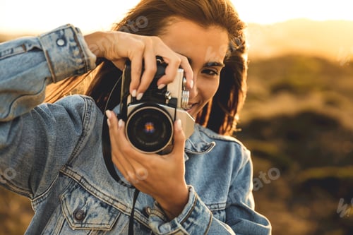 Preview: Woman Taking Picture Outdoors