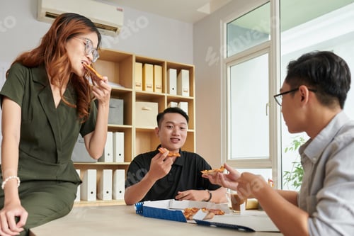 Preview: Colleagues Eating Pizza for Lunch