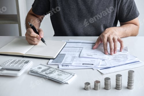 Preview: Man Analyzing Finances and Planning Investment Growth