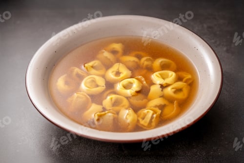 Preview: Traditional Italian tortellini in brodo serving warm delicious pasta