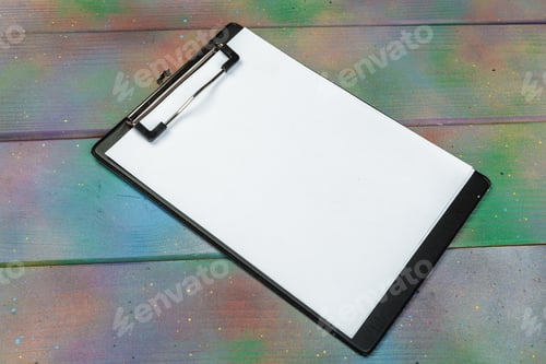 Preview: Blank paper on wooden clipboard on dark wooden floor background