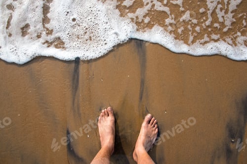 Preview: Feet on wet sand