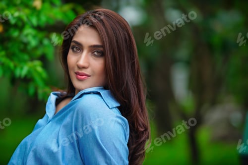 Preview: Portrait of a beautiful woman in nature