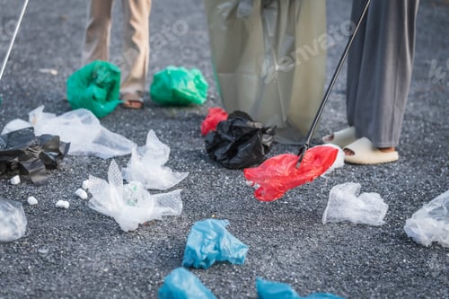 Preview: Women are helping to collect separate garbage, focusing on plastic waste management.sort plastic
