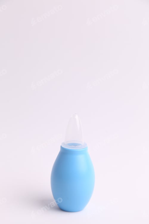 Preview: Closeup shot of a nasal aspirator for babies in colored background