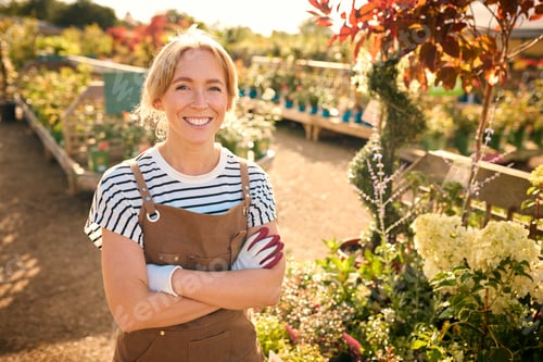 Preview: Portrait Of Smiling Woman Working Outdoors In Garden Centre