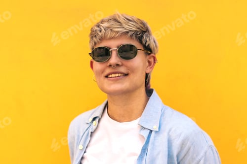 Preview: young girl with short hair, sunglasses and hair wicks. portrait