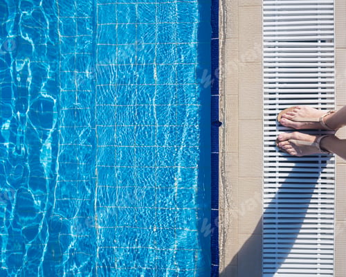 Preview: Relaxing by the poolside on a sunny day, enjoying the cool water and warm sunlight