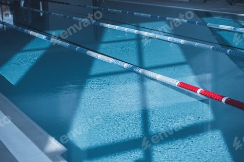 Preview: deep calm blue water with shadows in swimming pool