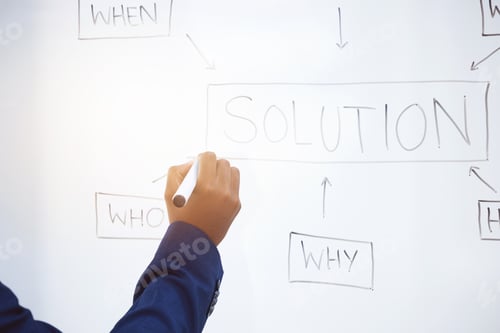 Preview: Shot of an unrecognizable businessman having a brainstorming session on a whiteboard