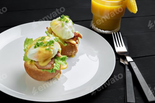 Preview: Top view of toasted buns with bacon, lettuce and poached egg
