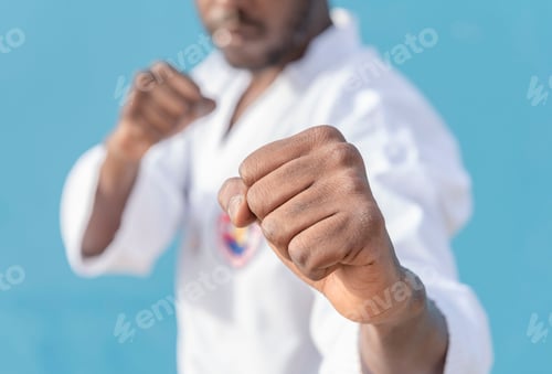 Preview: Taekwondo martial art , selective detail of focus on human hands.