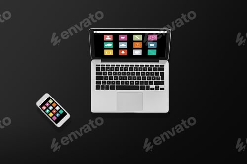Preview: laptop computer with menu icons and smartphone