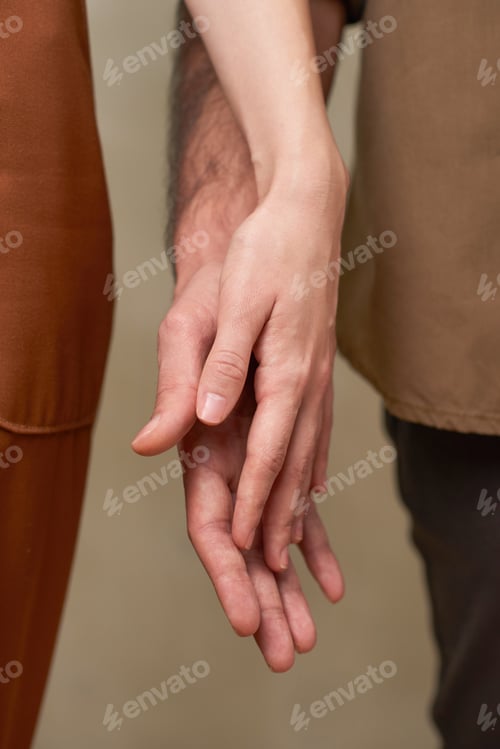 Preview: Couple Slightly Touching Hands