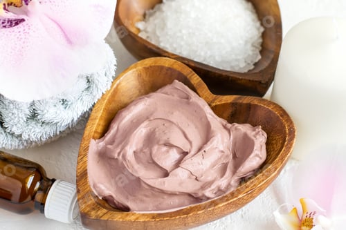 Preview: Spa setting. Cosmetic body And face mask made of pink clay