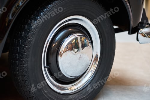 Preview: Vintage wheel with protector of retro car, closeup