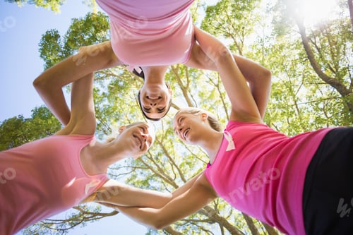 Preview: Portrait of young volunteer women forming huddles