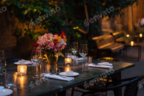 Preview: Elegantly set table at beautiful patio